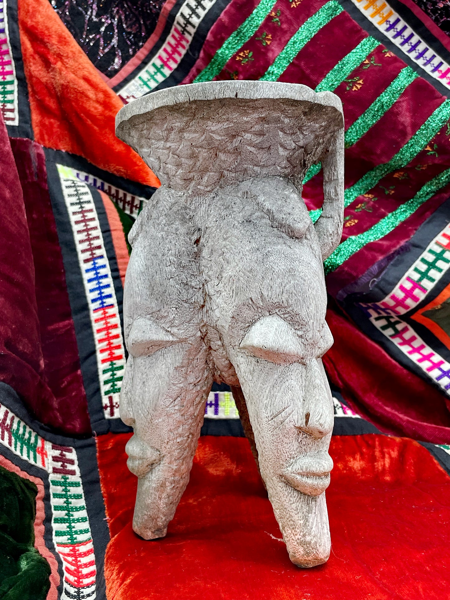 Full view of the hand-carved ethnographic cult object