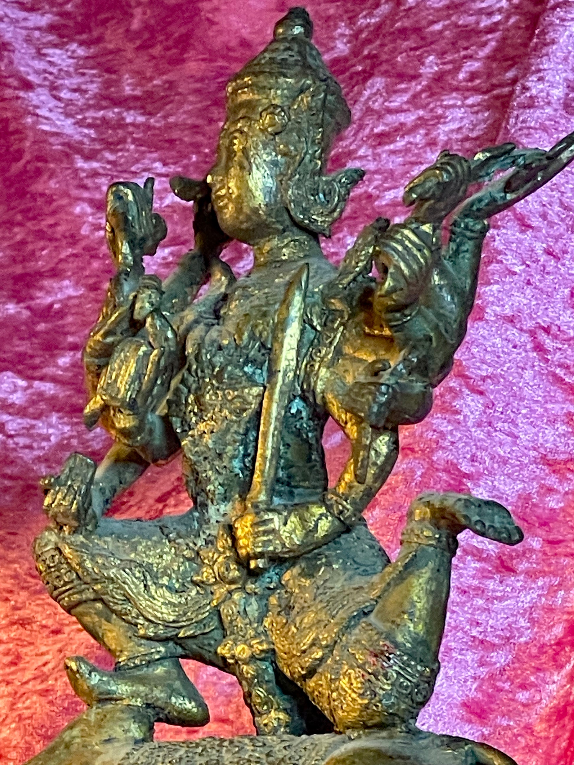 Ten-armed Shiva deity seated on the sacred bull Nandi, gilt bronze detail