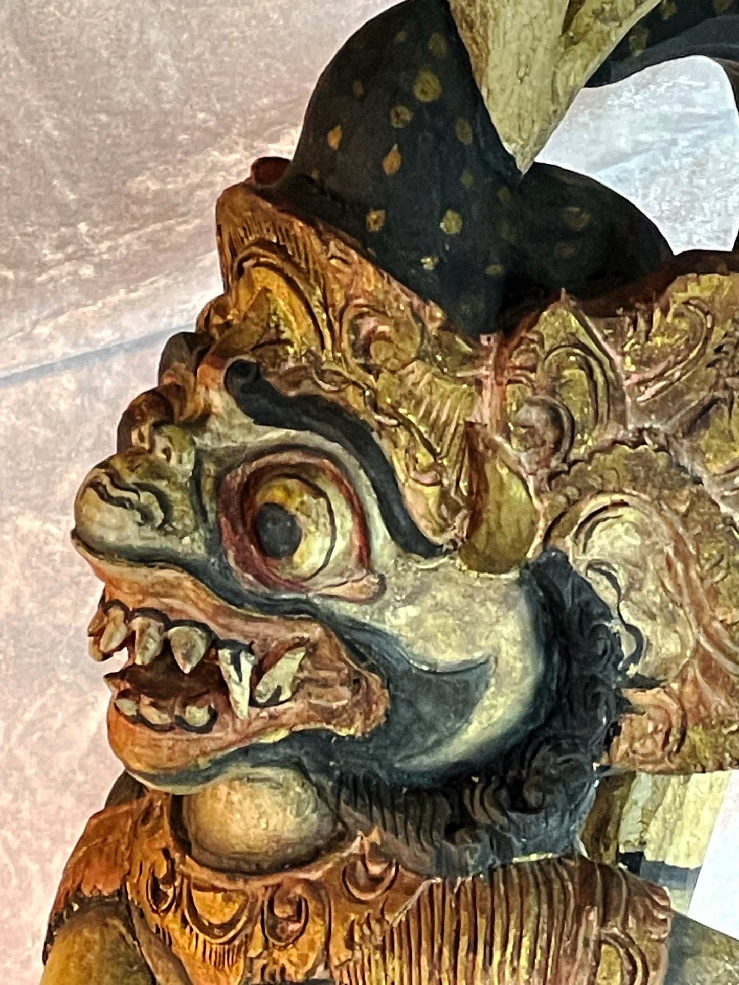Side profile of the Balinese Hanuman carving