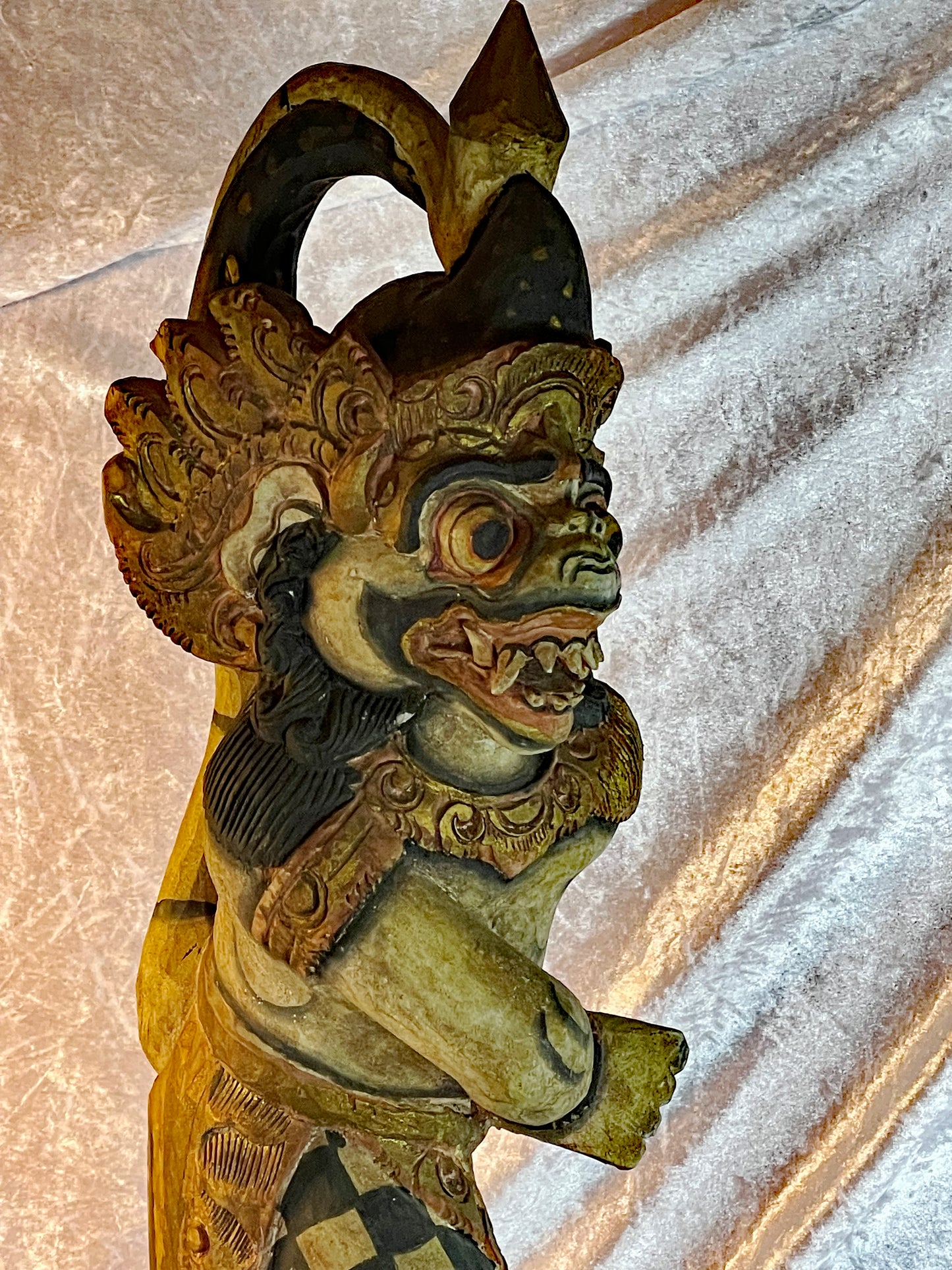 Three-quarter full view of the Balinese Hanuman wood carving