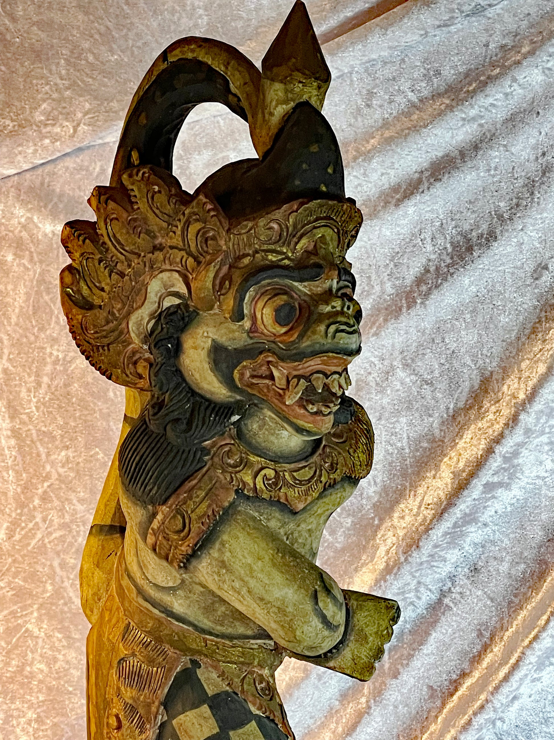 Three-quarter full view of the Balinese Hanuman wood carving