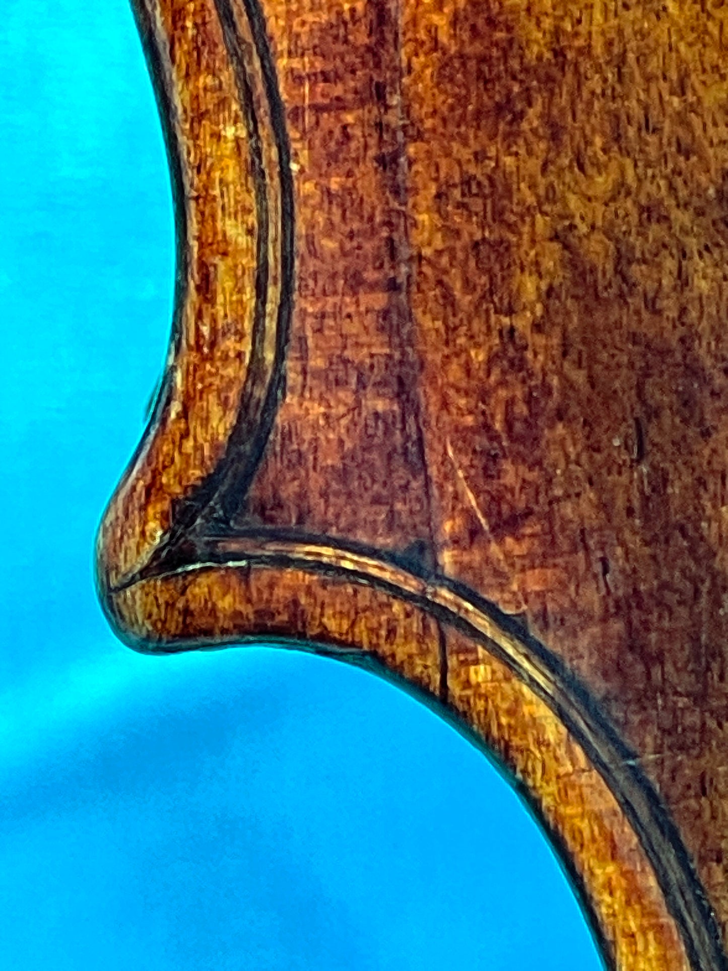 Antique violin side and rib detail showing varnish