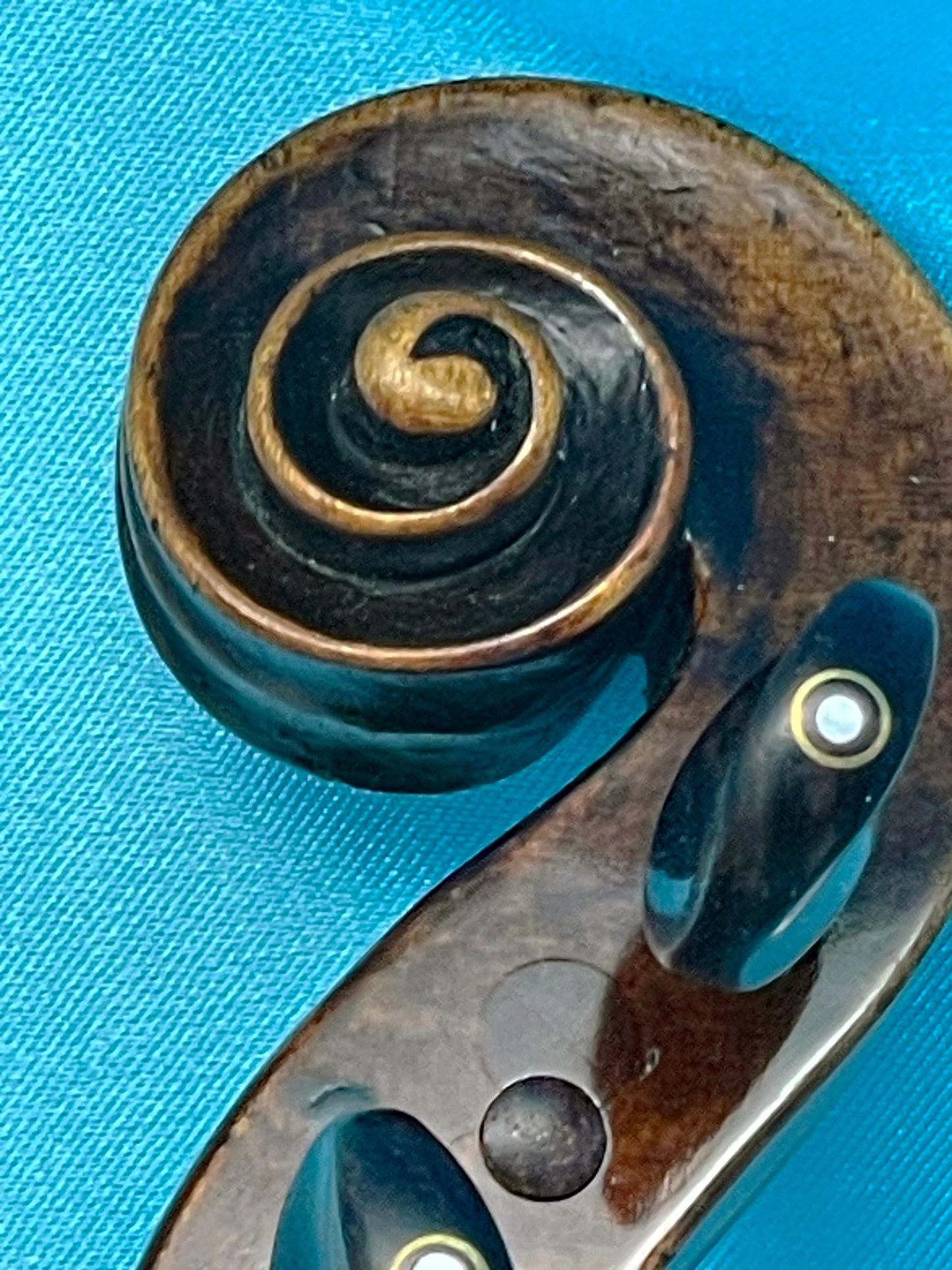 Antique violin detail of the f-hole and bridge area