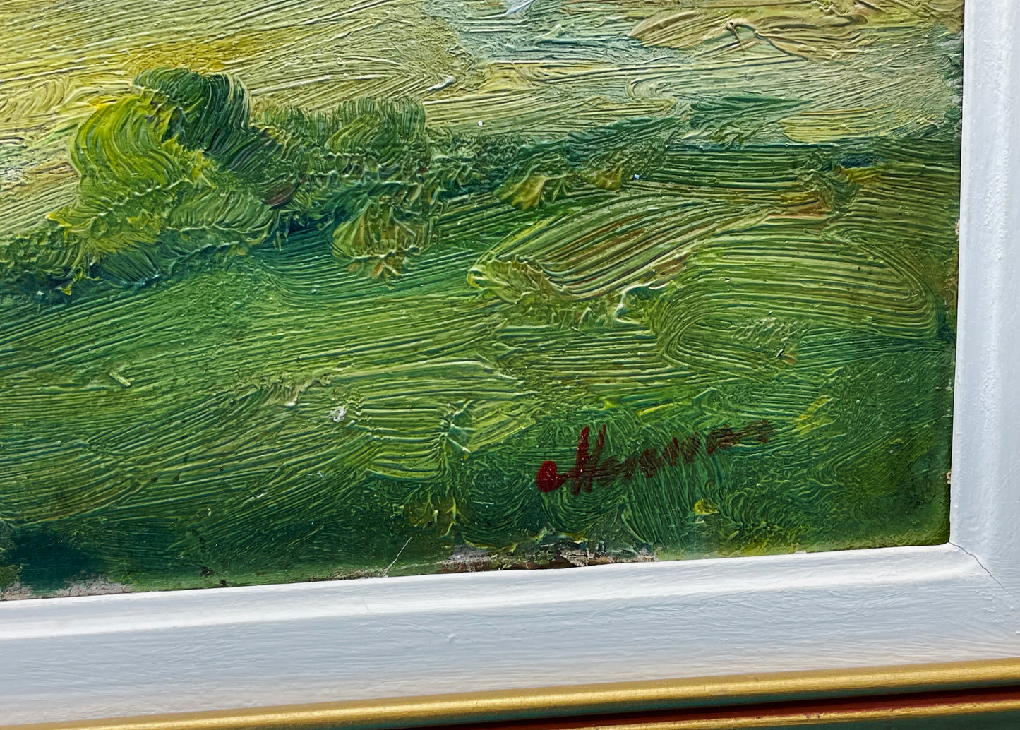 Close-up of the artist signature “Harsia” lower right on the painting