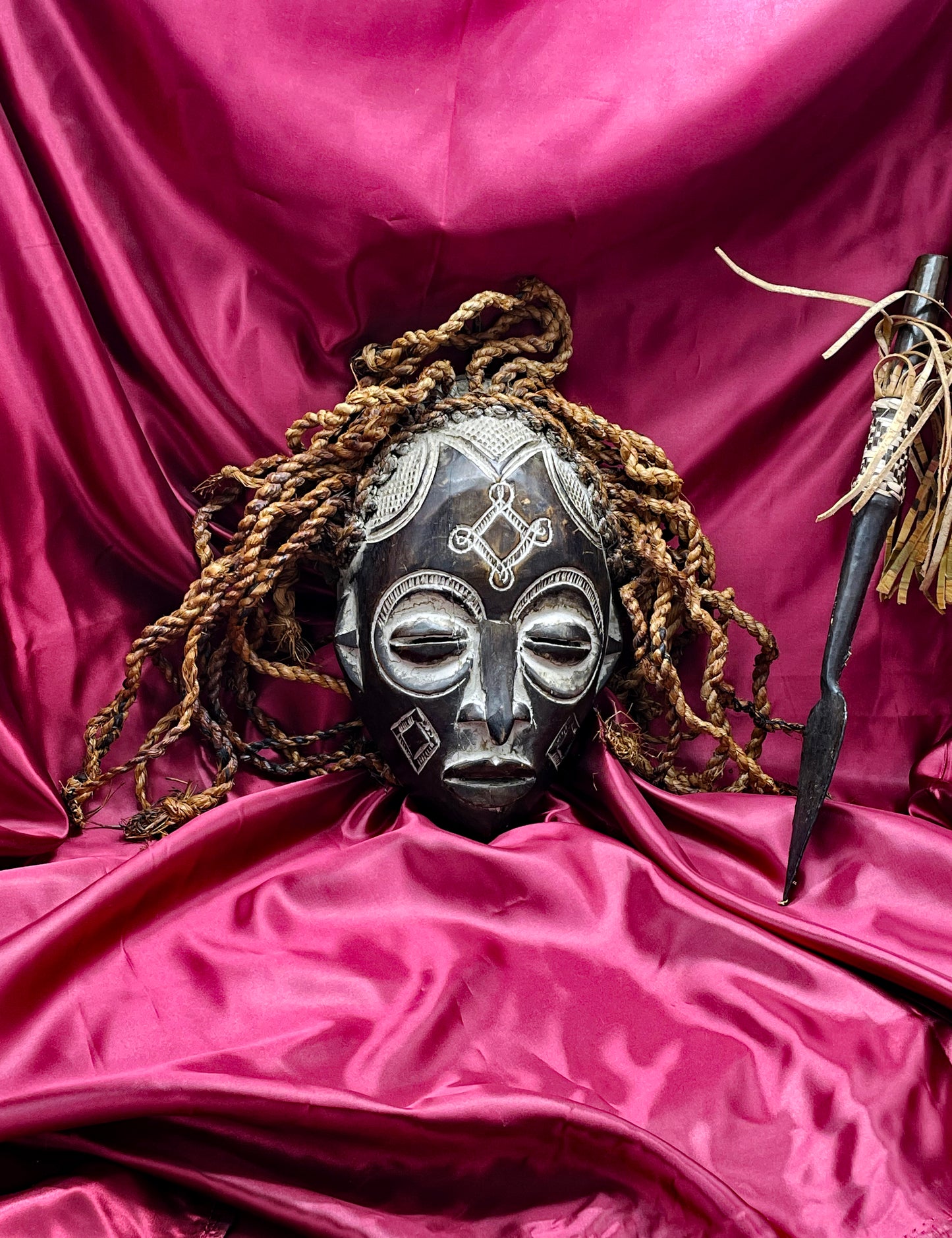 Mid-20th Century Chokwe Mask with Raffia Braids and Ceremonial Iron Arrow – Likely Congo