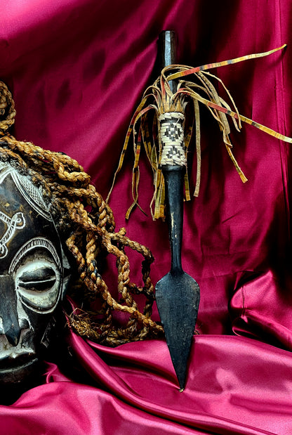 Mid-20th Century Chokwe Mask with Raffia Braids and Ceremonial Iron Arrow – Likely Congo