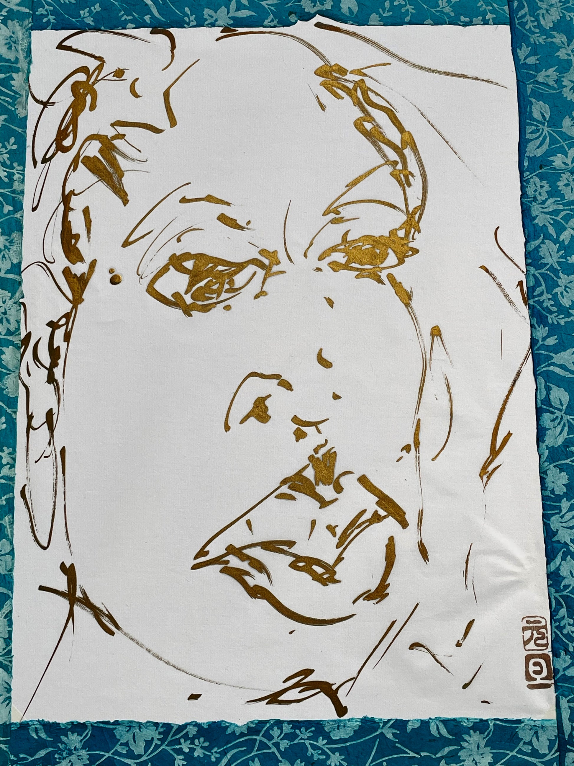 Gold-ink drawn face on cream paper, complete sheet detail