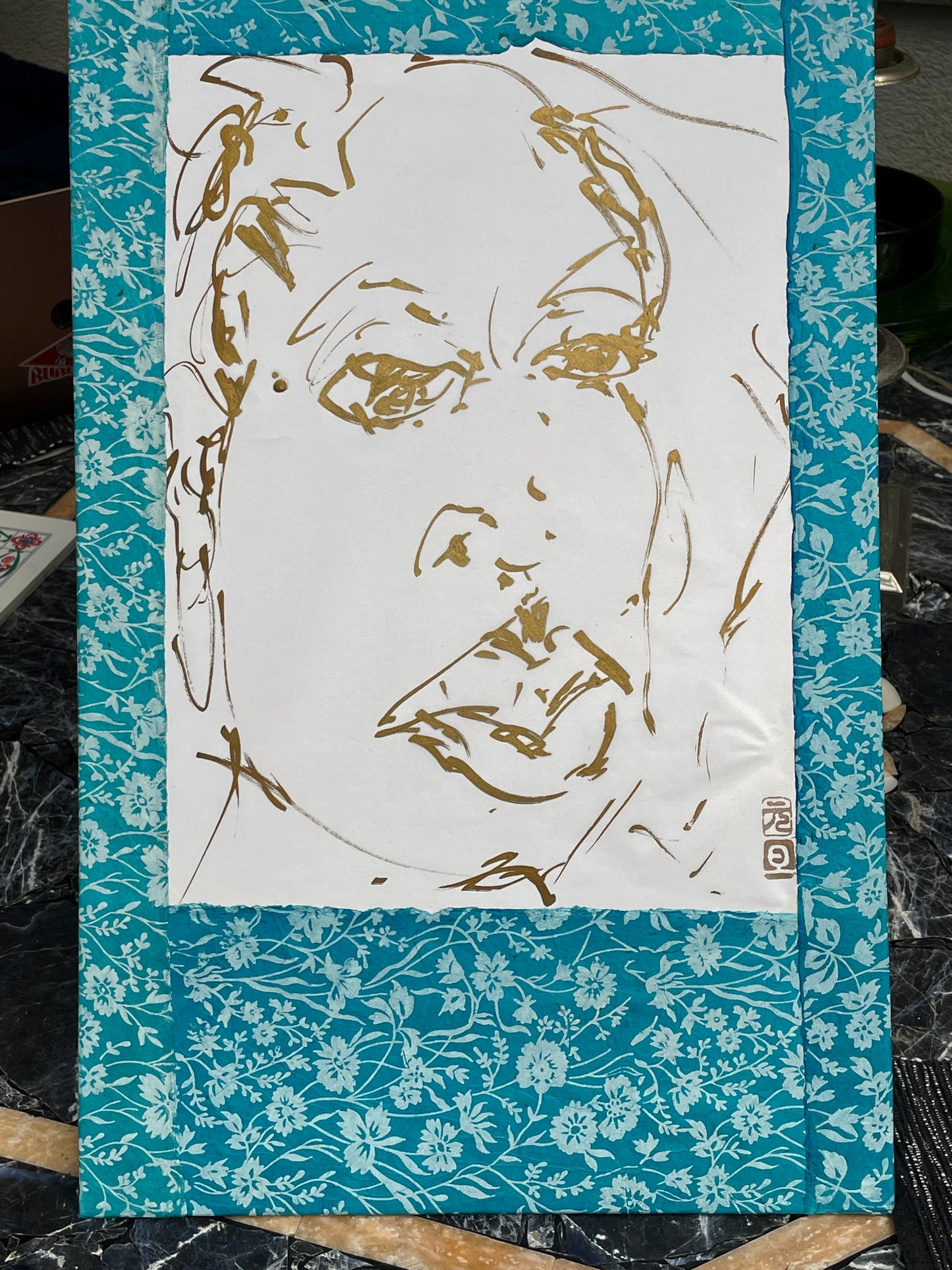 Expressive gold portrait drawing on paper, full sheet