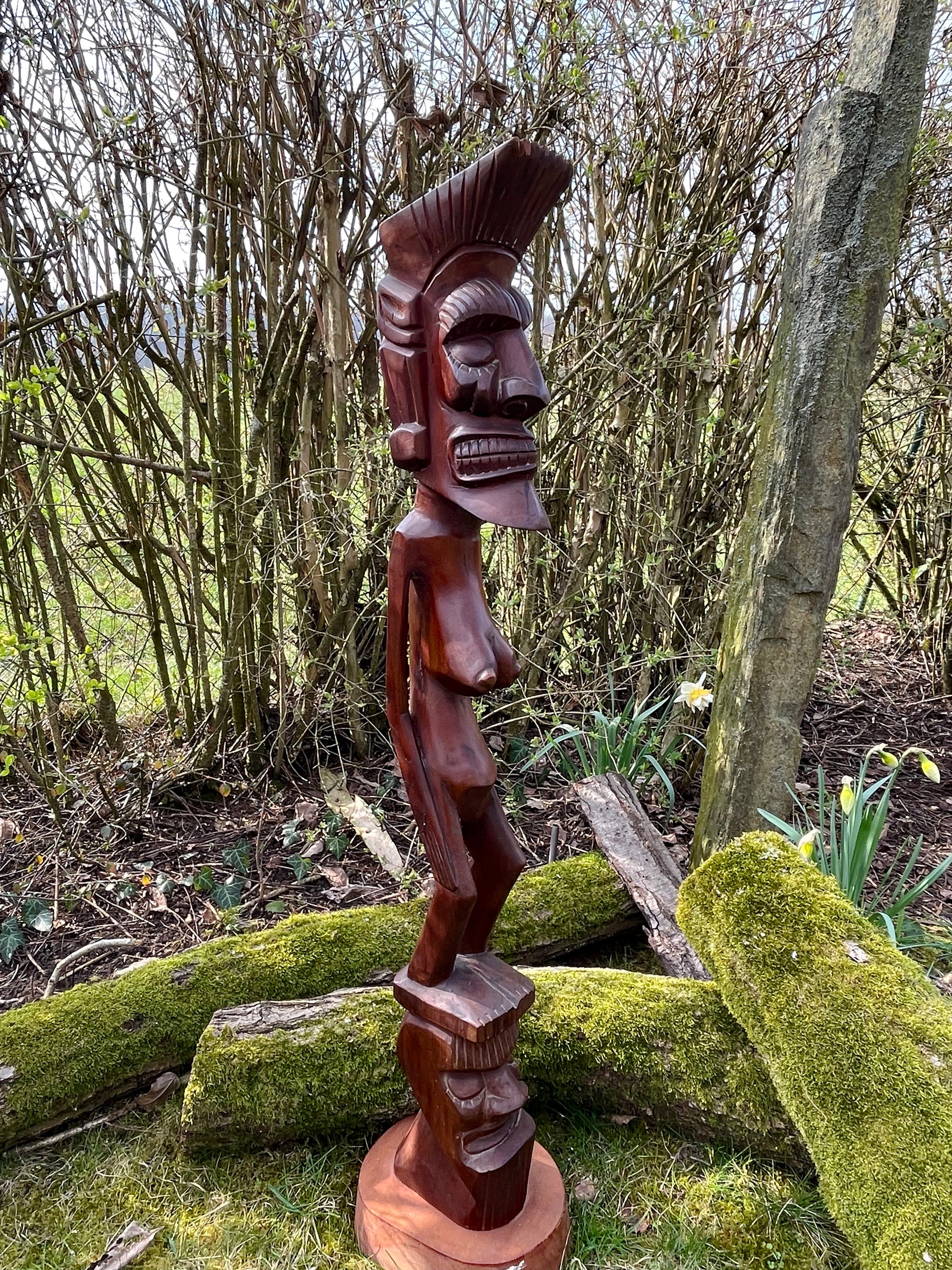 Hand-carved African wood spirit figure, alternate three-quarter angle