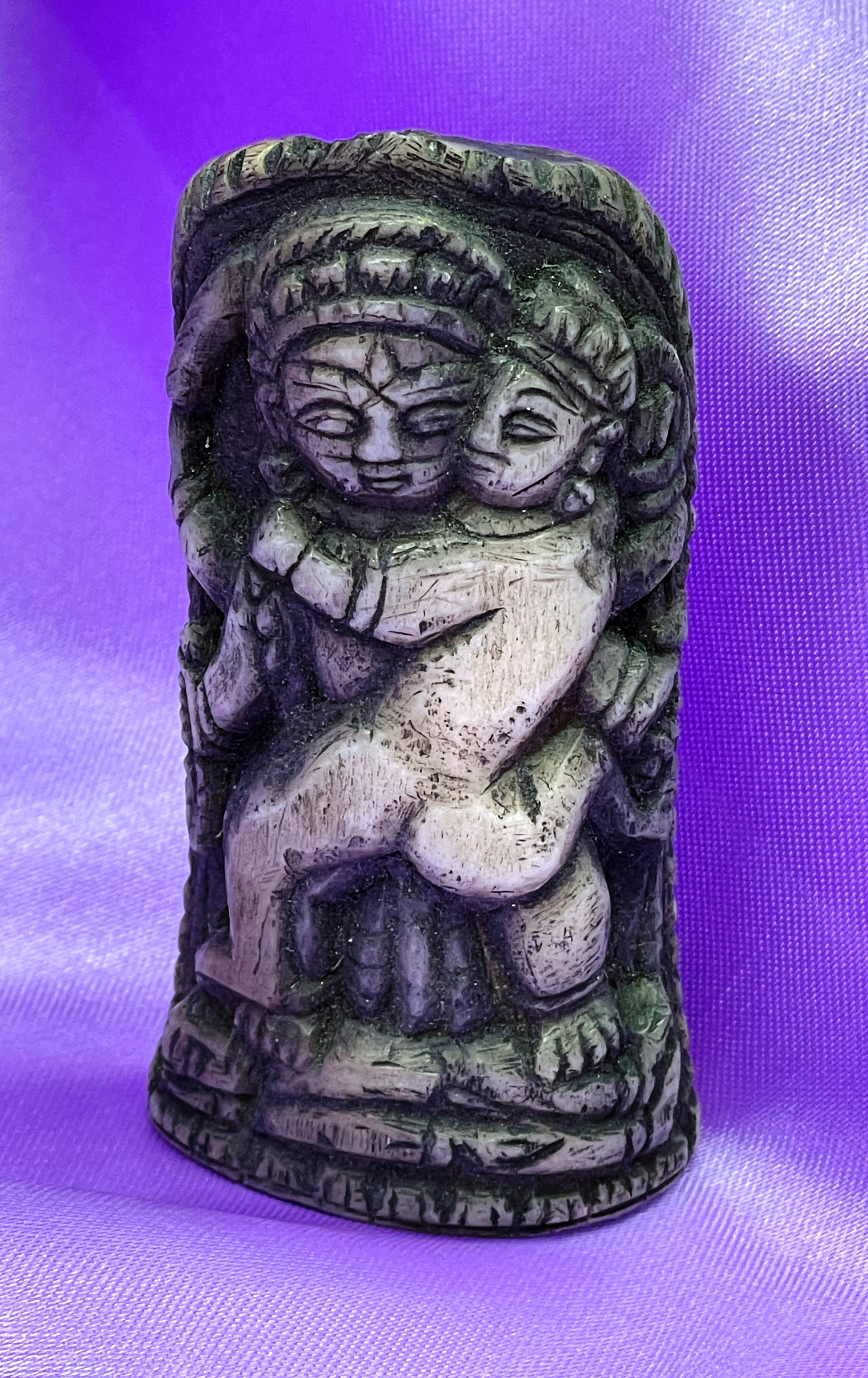 Indian bone plaque, angled view