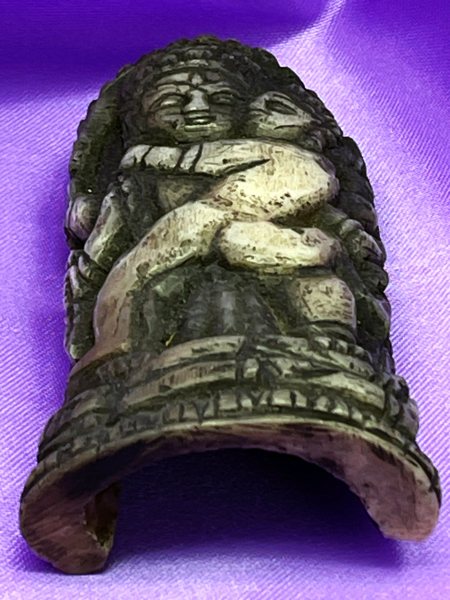 Curved depth of the carved bone plaque