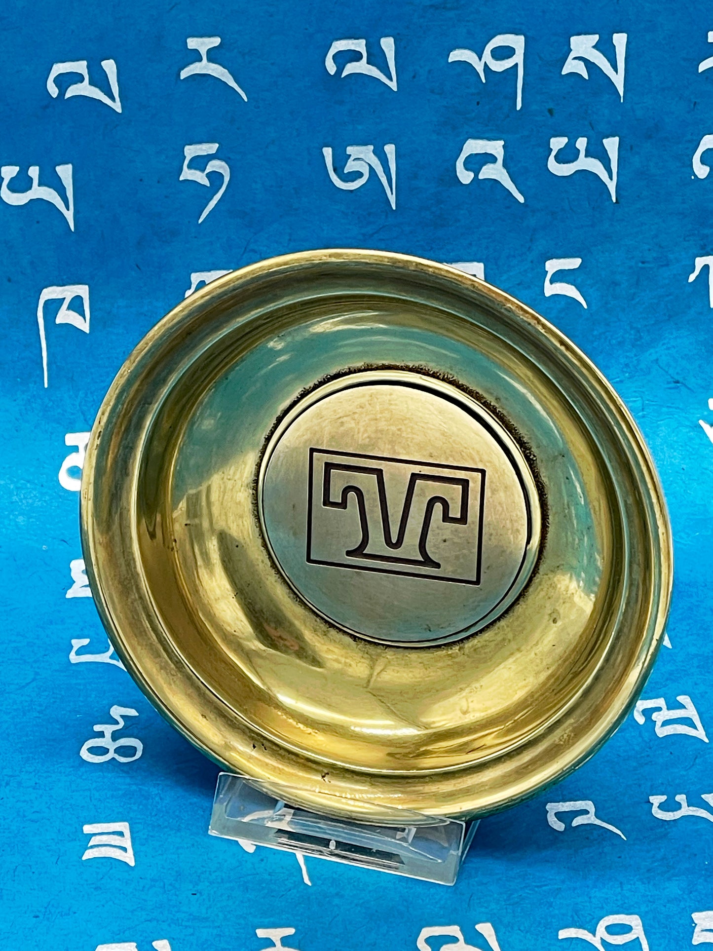 Solid brass plate with central engraved monogram