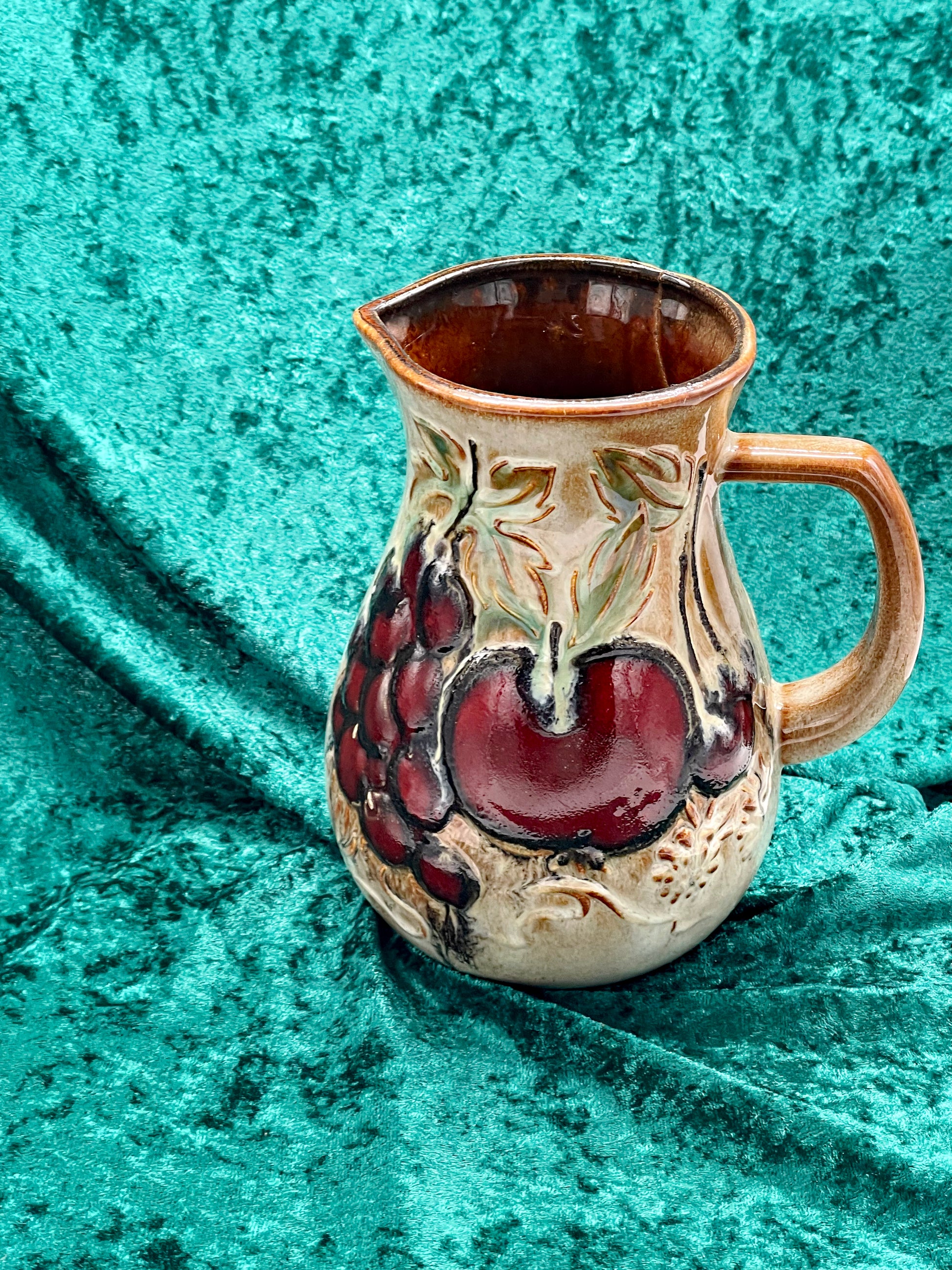 Scheurich West German pottery wine jug, hand-painted grape and apple fruit relief on cream glaze