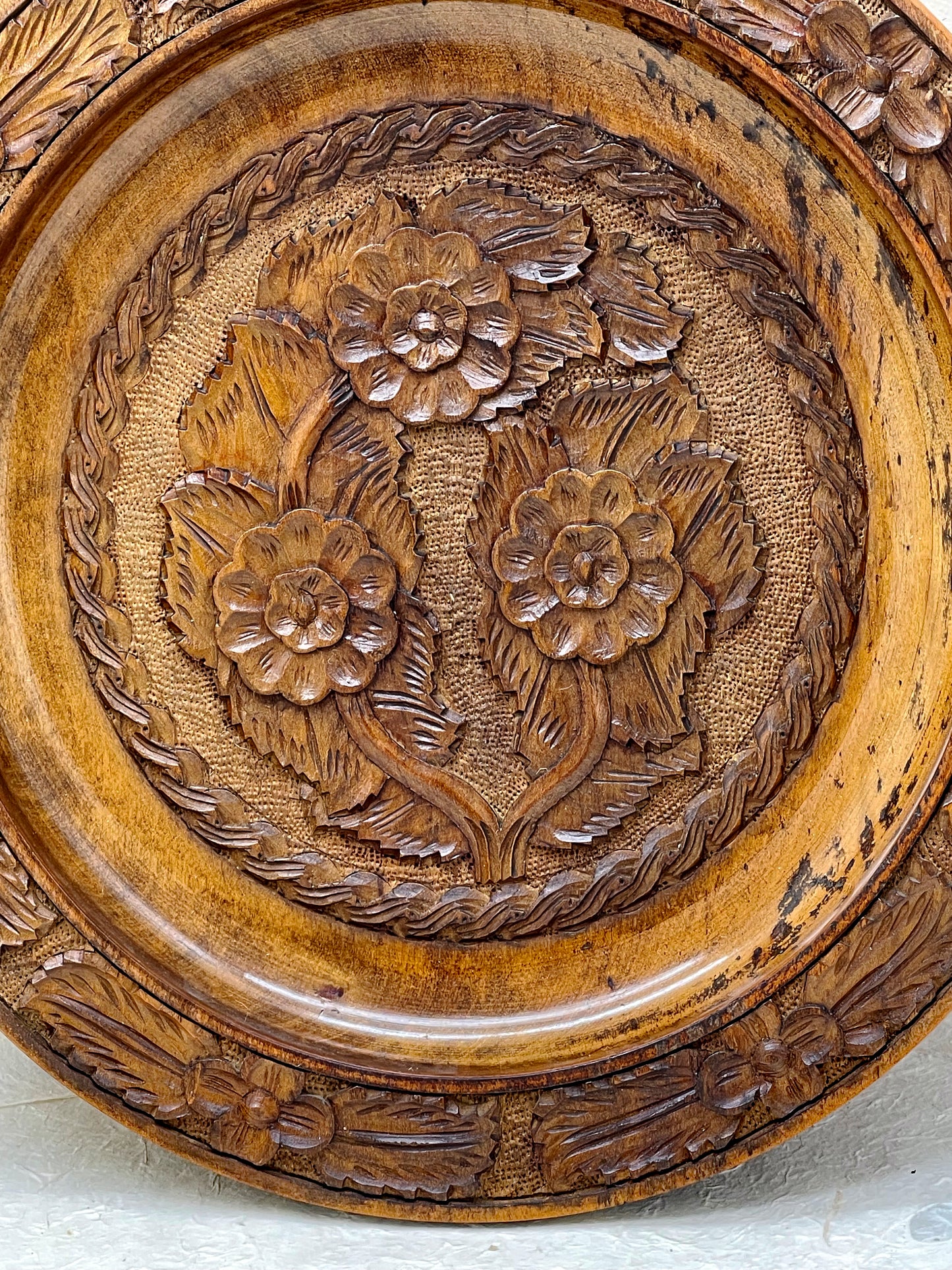 Side profile of carved wooden wall plate