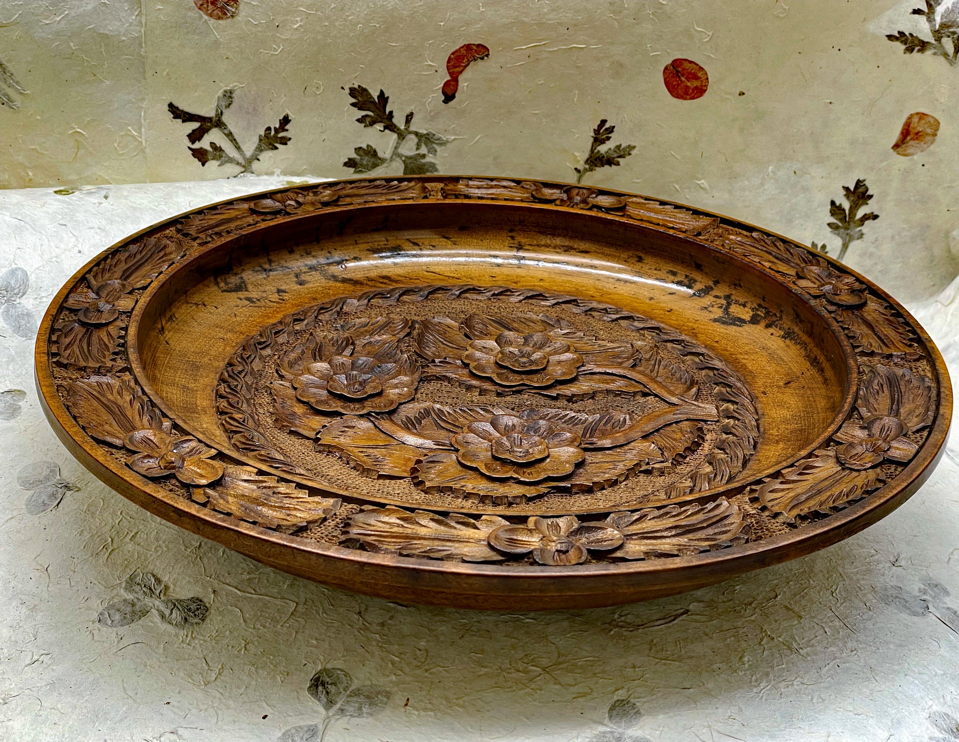Full view of decorative carved wooden collector's plate