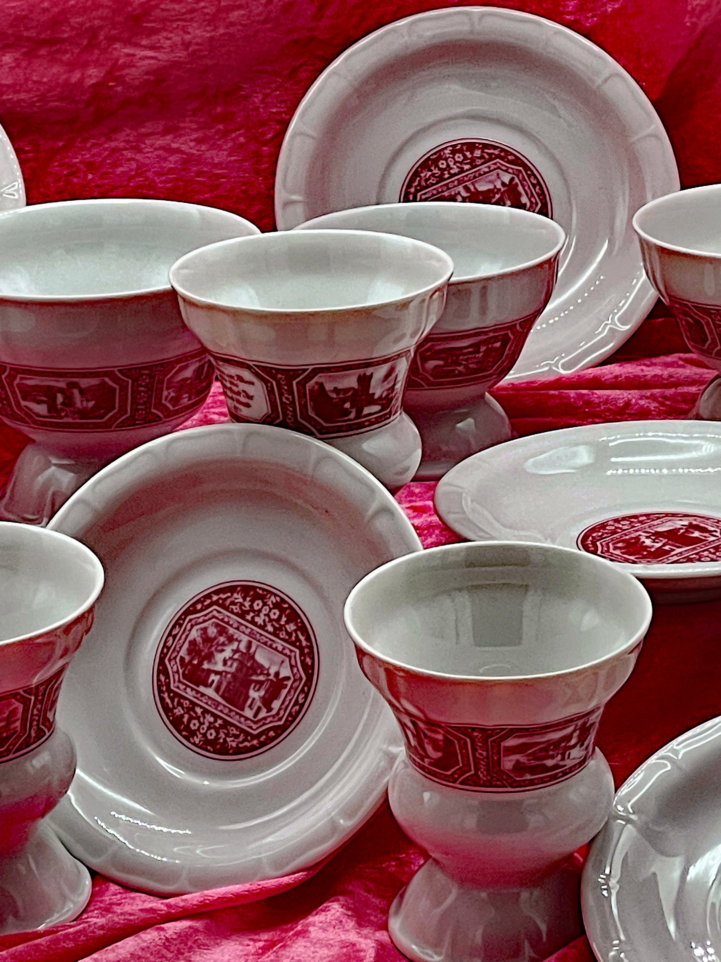Group of footed Heinrich porcelain liqueur beakers