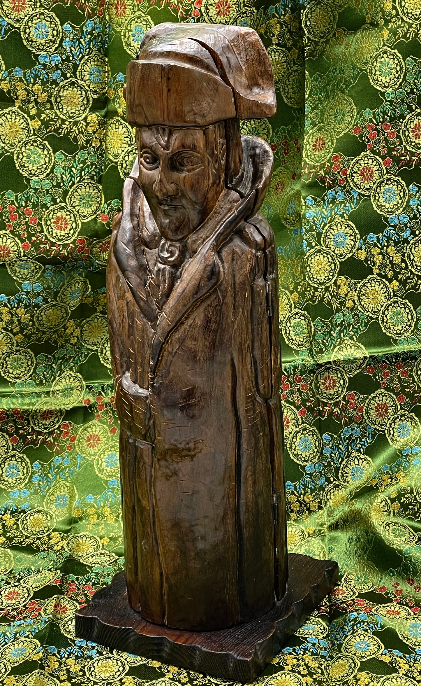 Carved wooden Napoleon novelty bottle cover, side profile