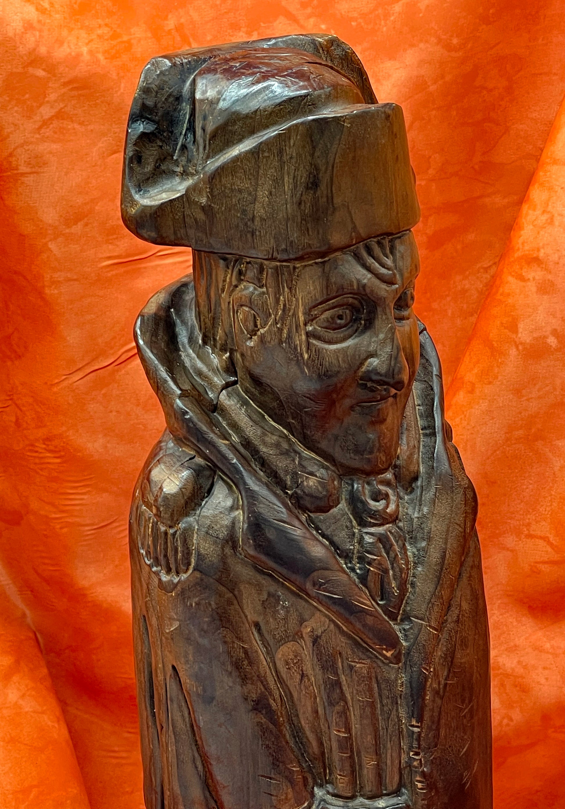 Hand-carved Spanish wooden Napoleon folk-art figure, close-up of face and bicorne hat