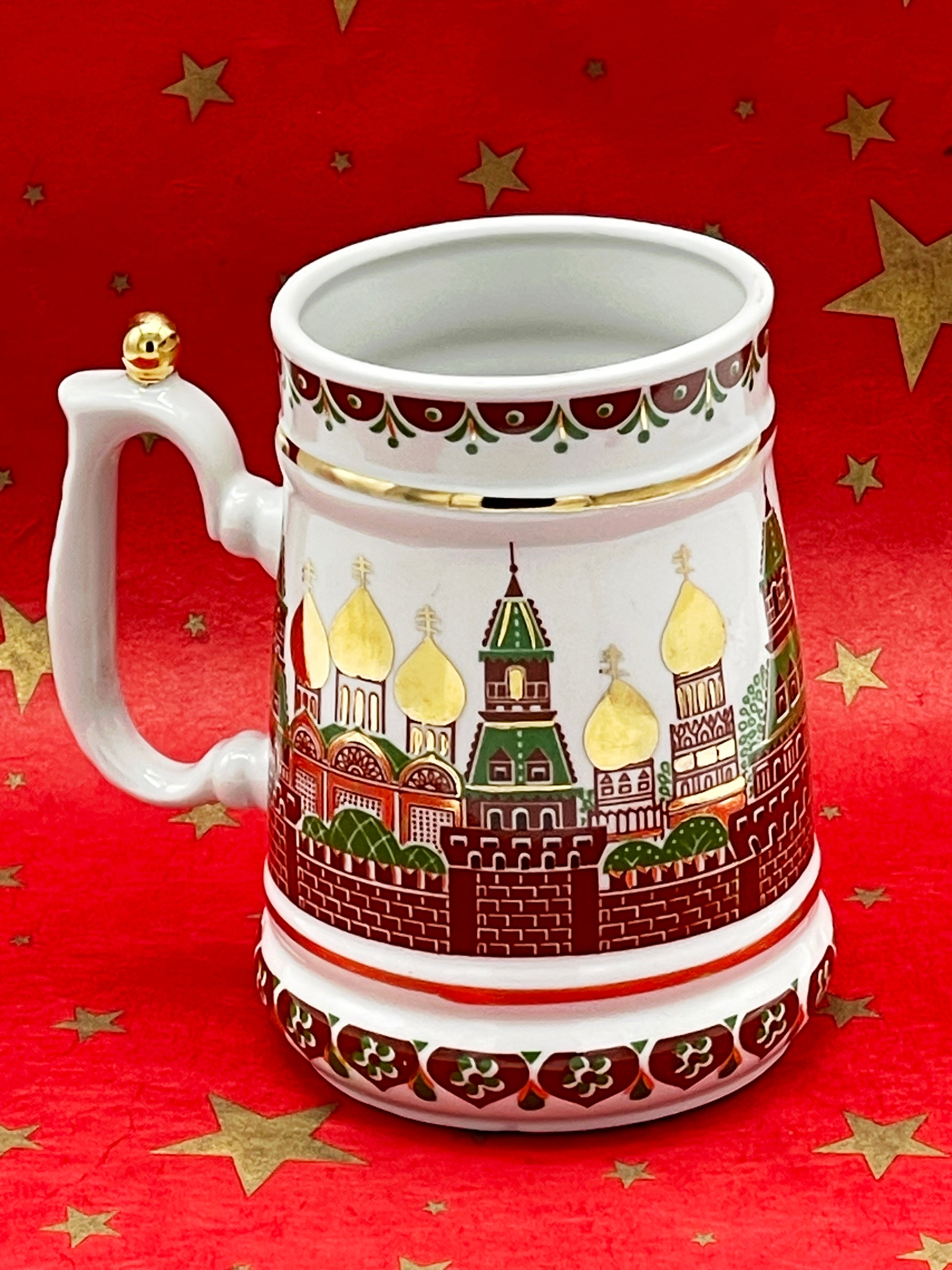 Russian porcelain beer stein with gilded Kremlin cathedral motif