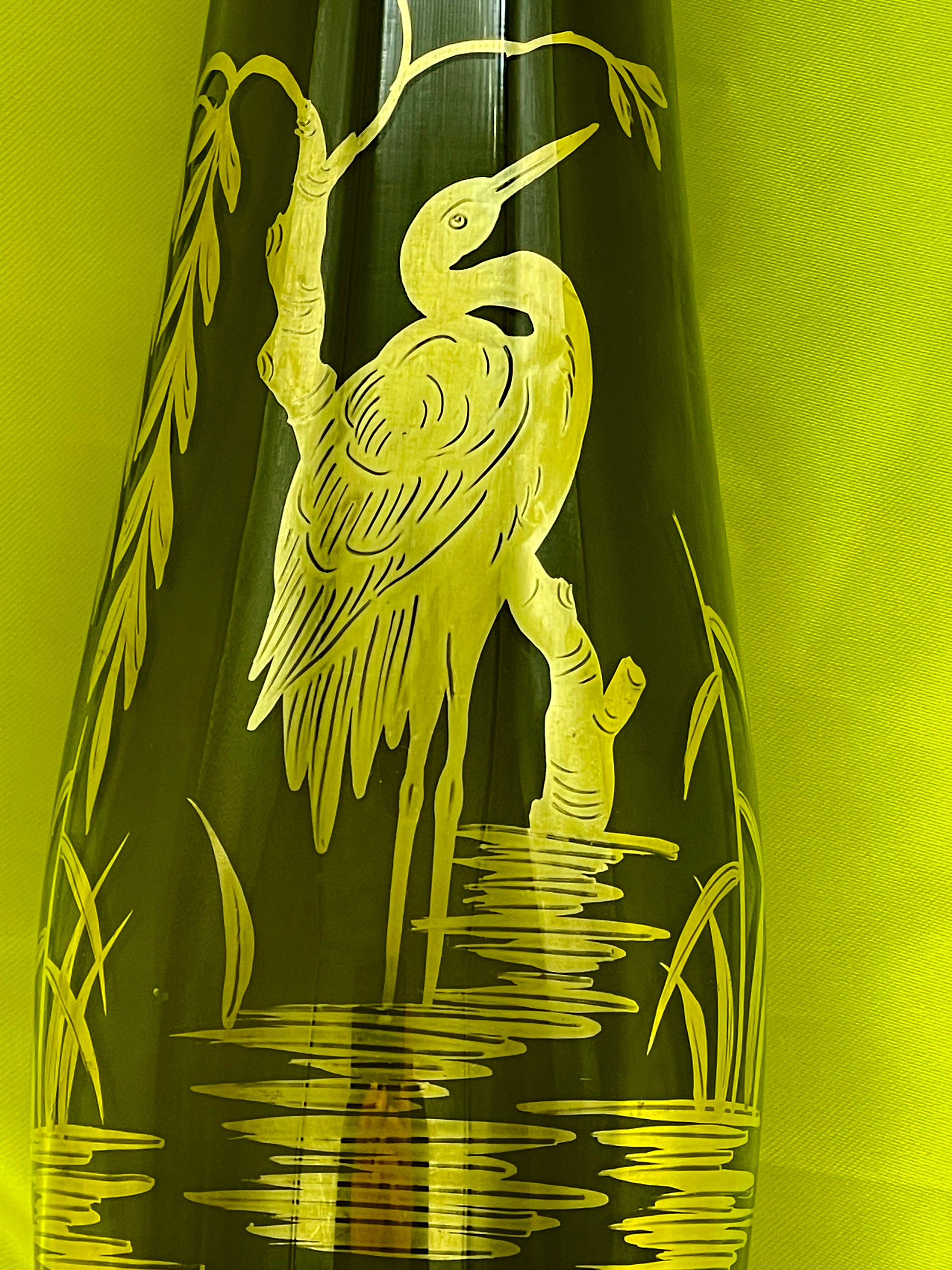 Side view of mid-century German green glass vase