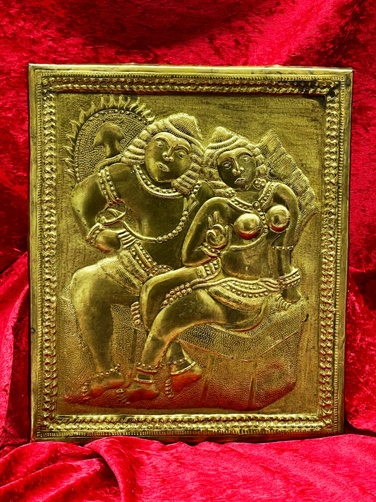 Antique Thai brass repoussé relief of Rama and Sita embracing, on red velvet