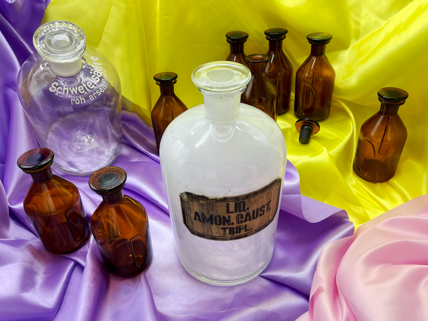 Pair of large clear vintage German lab bottles with ground-glass stoppers