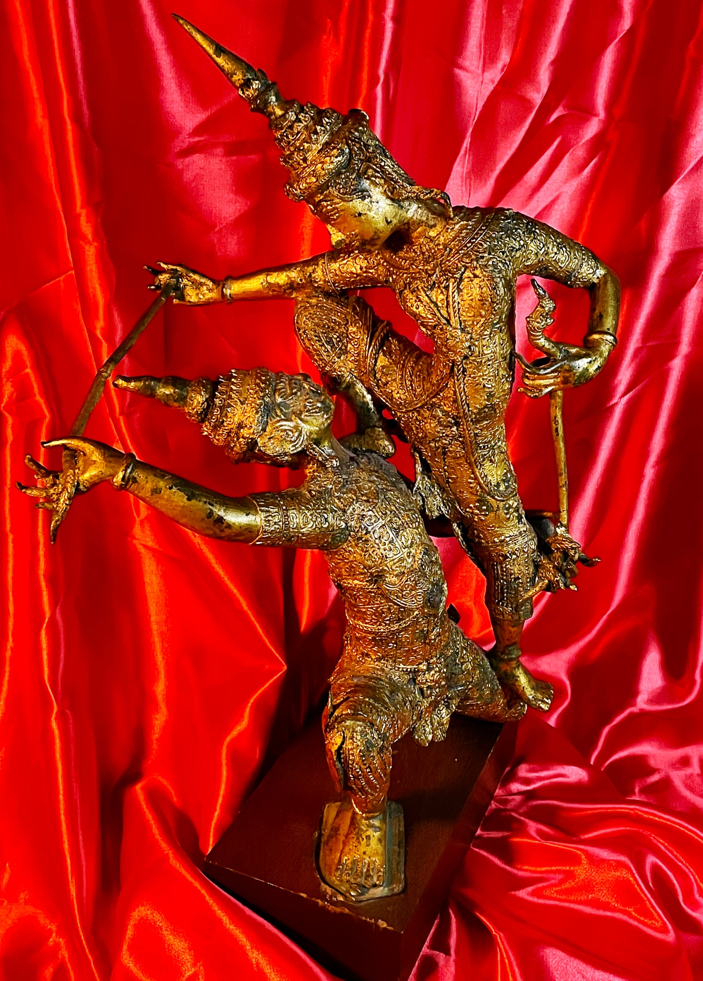 Two fighting Thai temple guardians, dynamic full figure view
