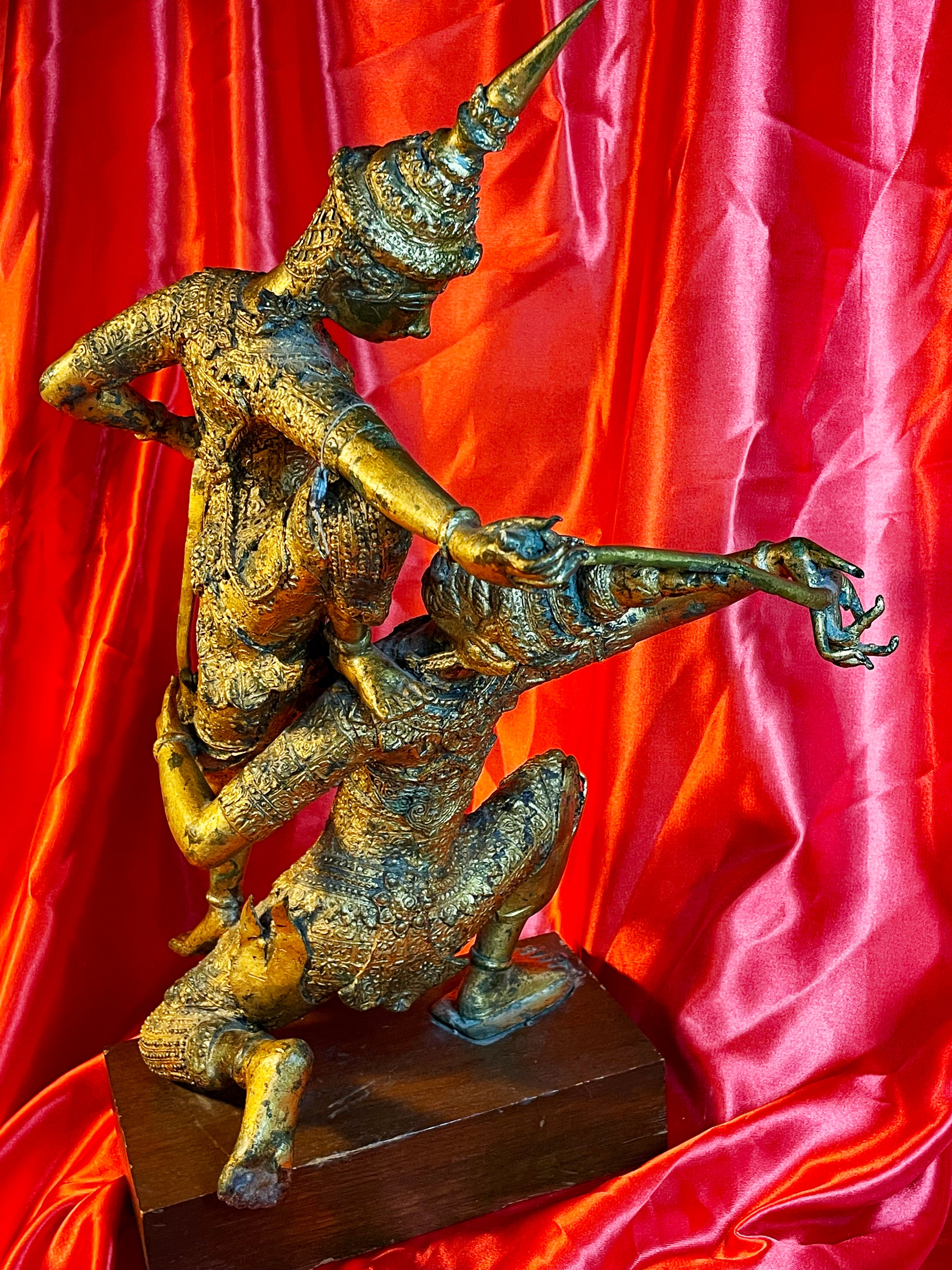 Antique Thai bronze temple guardians, opposite side profile