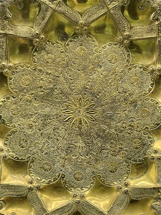 Solid brass decorative wall plate with hand-engraved star and floral medallion