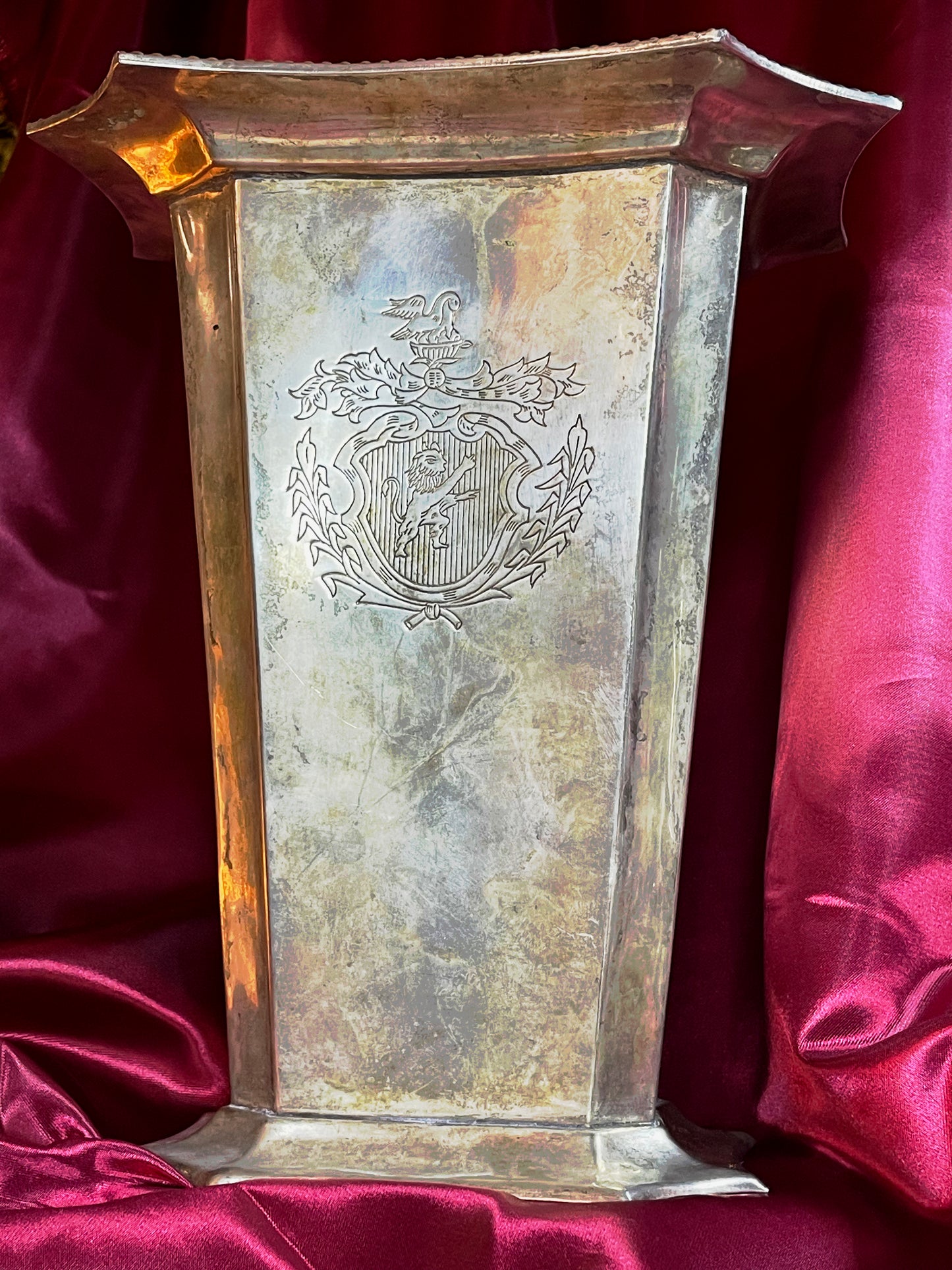 Hand engraved armorial crest with lion and pelican on English silver champagne cooler