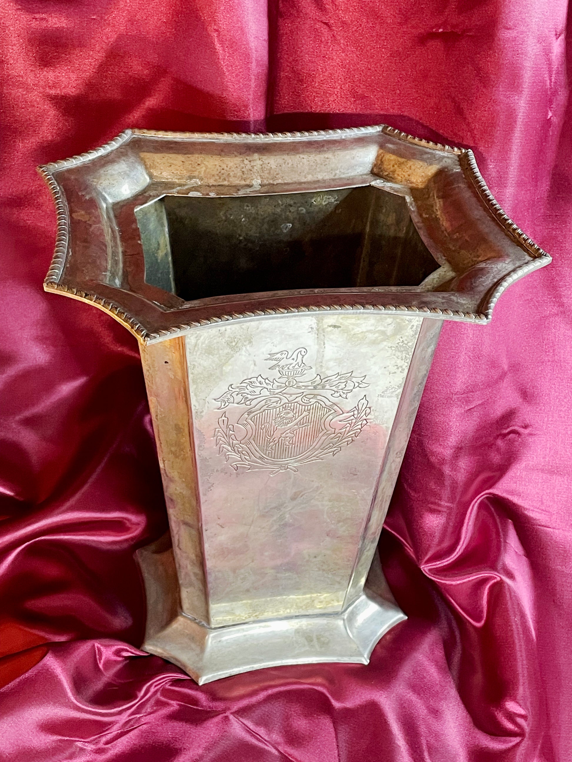 Silver plated champagne cooler showing interior and gadrooned rim, three quarter view