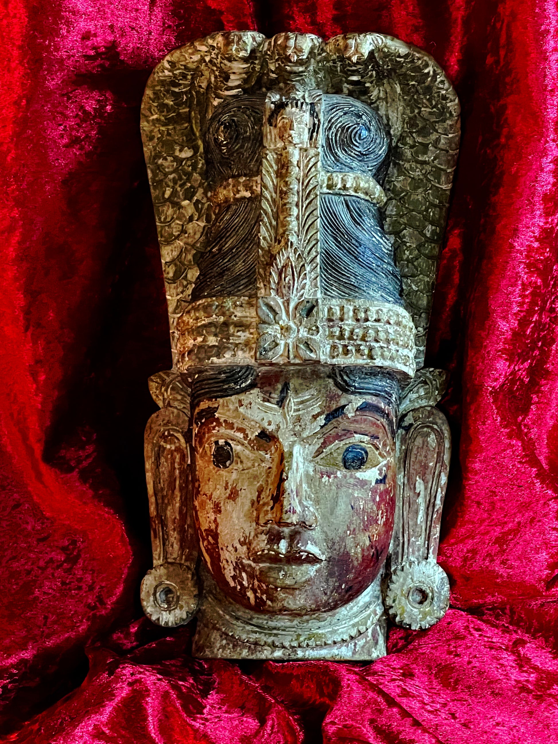 Naga deity mask front view with towering cobra crown and Kirtimukha face
