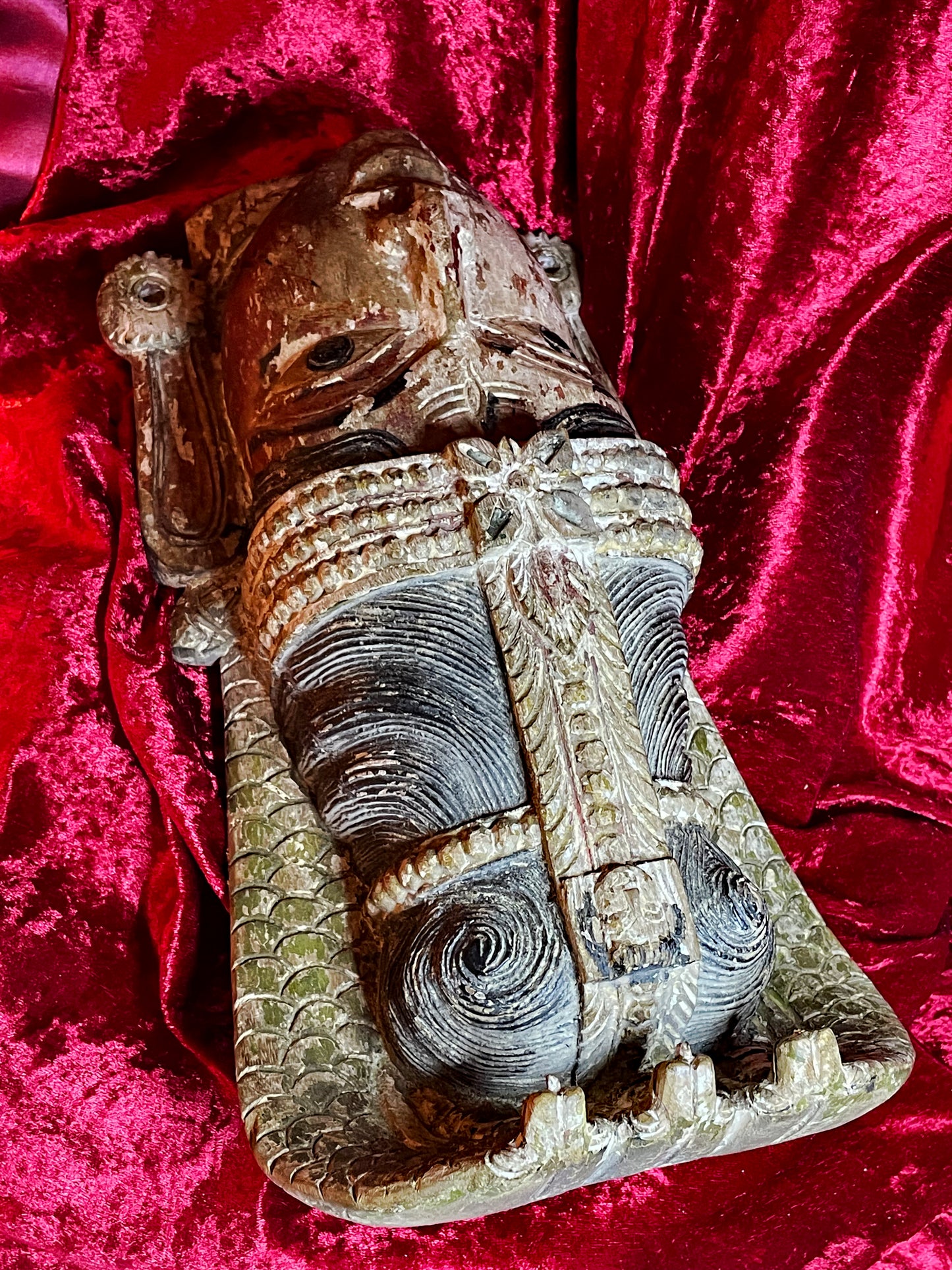 Dramatic angled view showing the depth of the temple carving