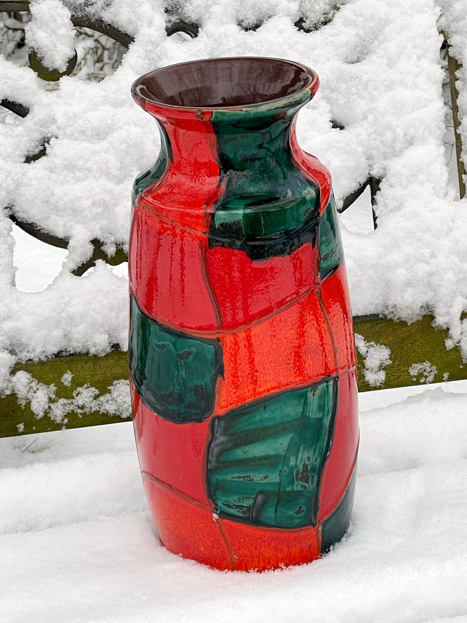 Large Scheurich West German floor vase with red and green harlequin glaze, full upright view