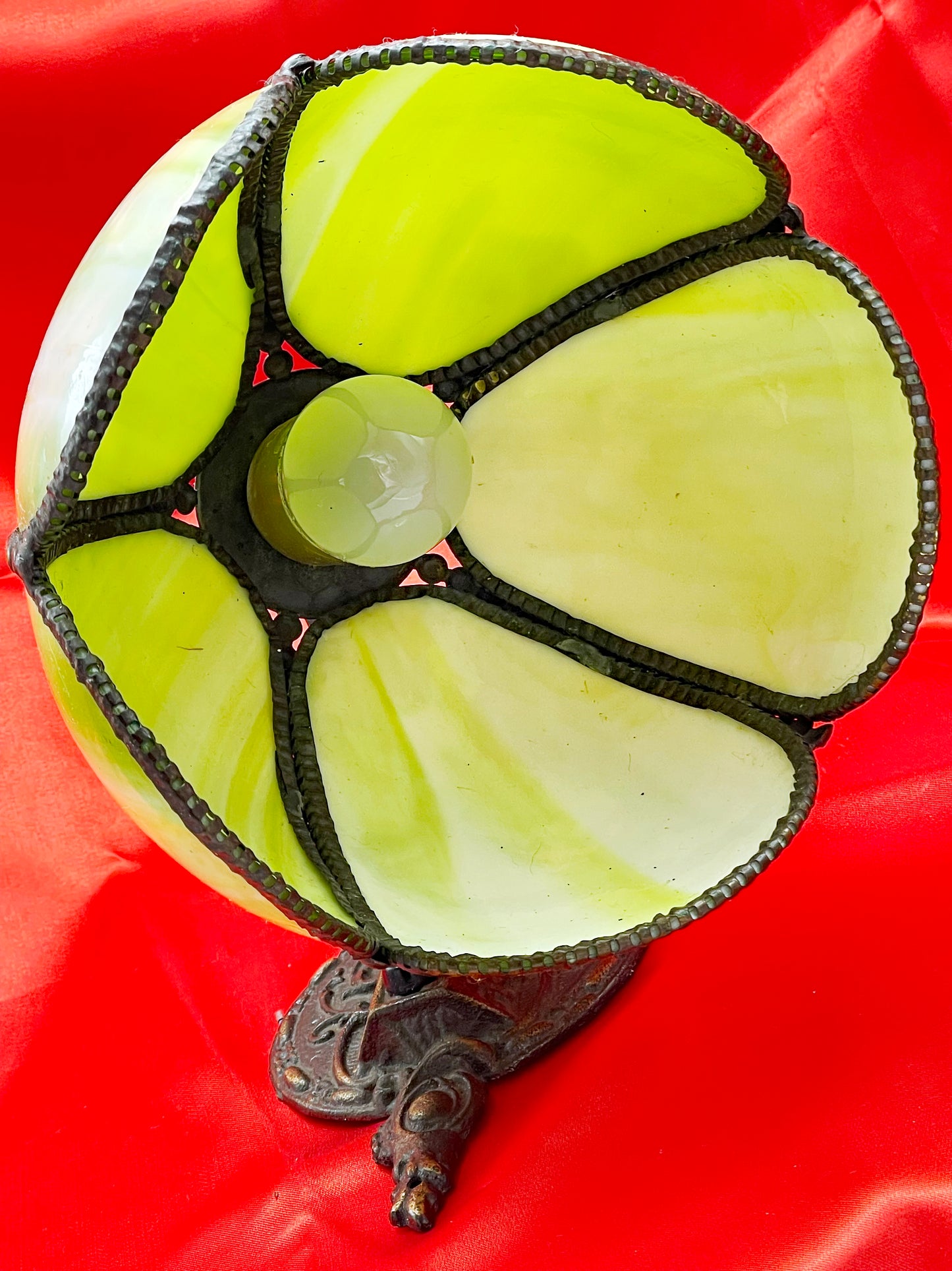Detail of the ornate cast bronze base with original Bakelite push switch