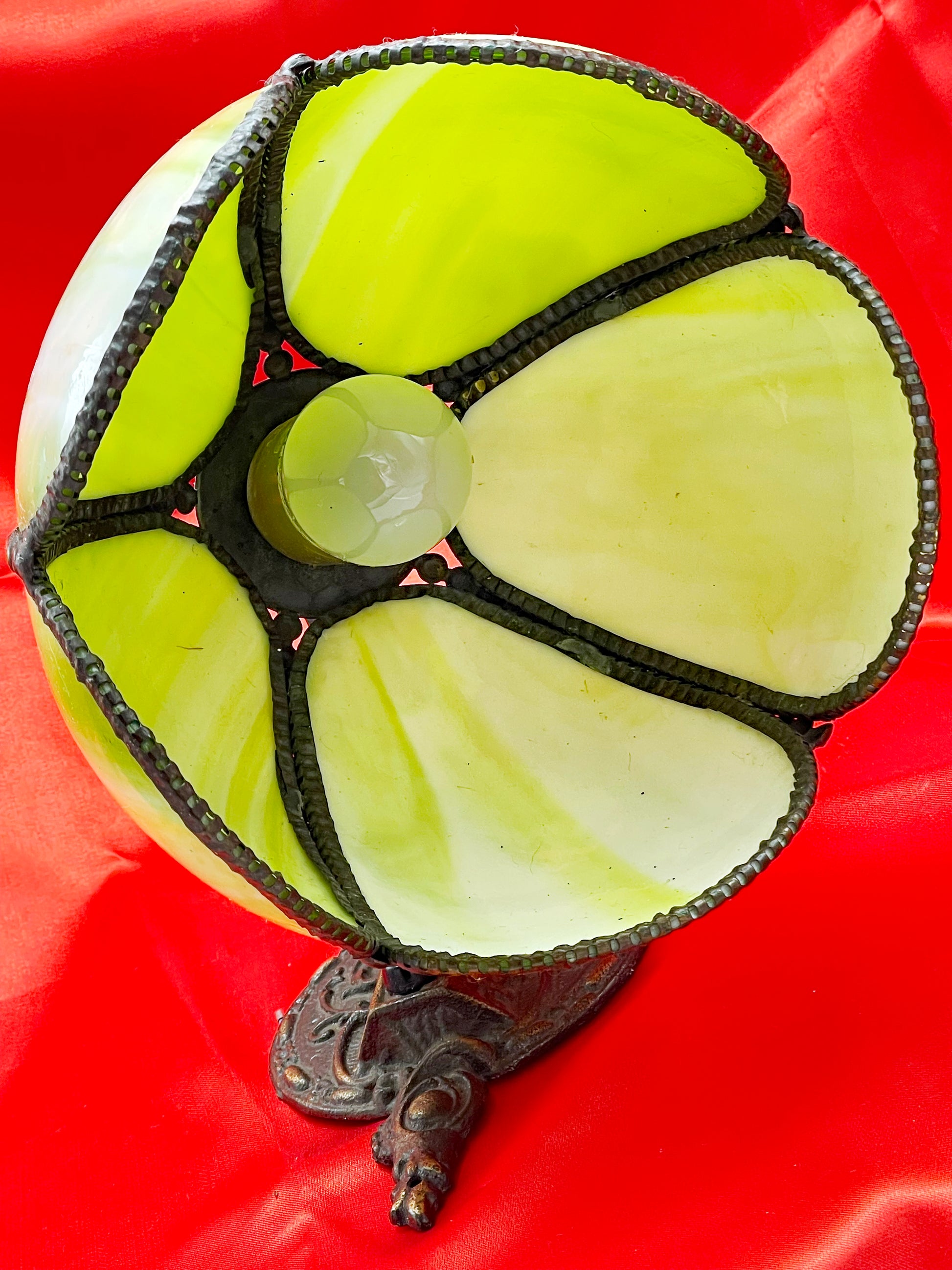 Detail of the ornate cast bronze base with original Bakelite push switch