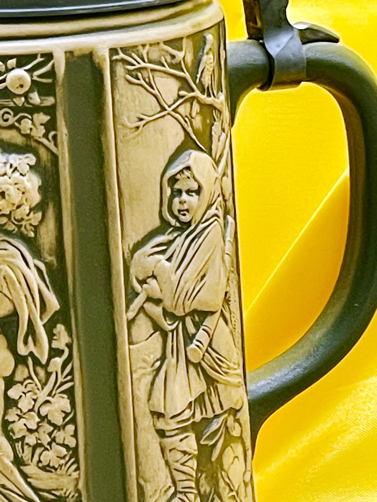 White German beer stein decorated with gilded Thaler coin medallions and pewter lid
