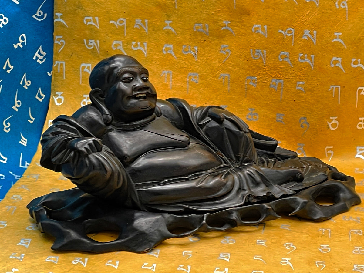 Antique Chinese ebony Buddha carving, detail of pose and drapery