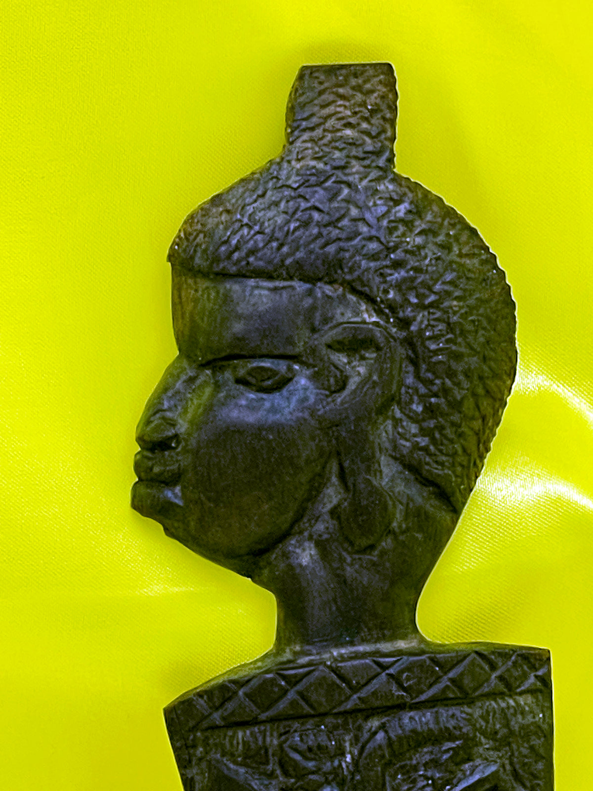 Back view detail of the hand carved African ebony pair