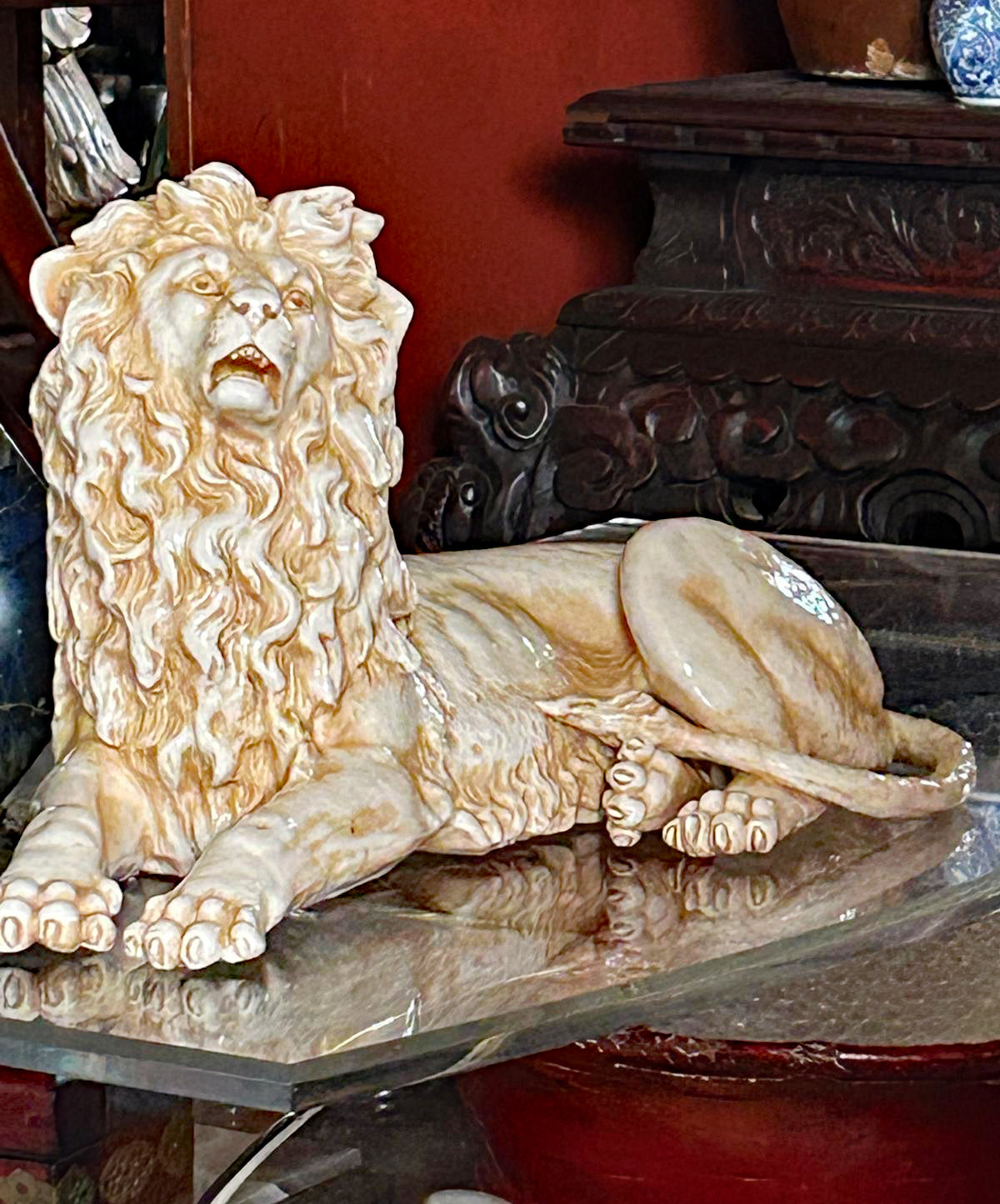 Rare New York and Rudolstadt porcelain recumbent lion figurine, full profile view