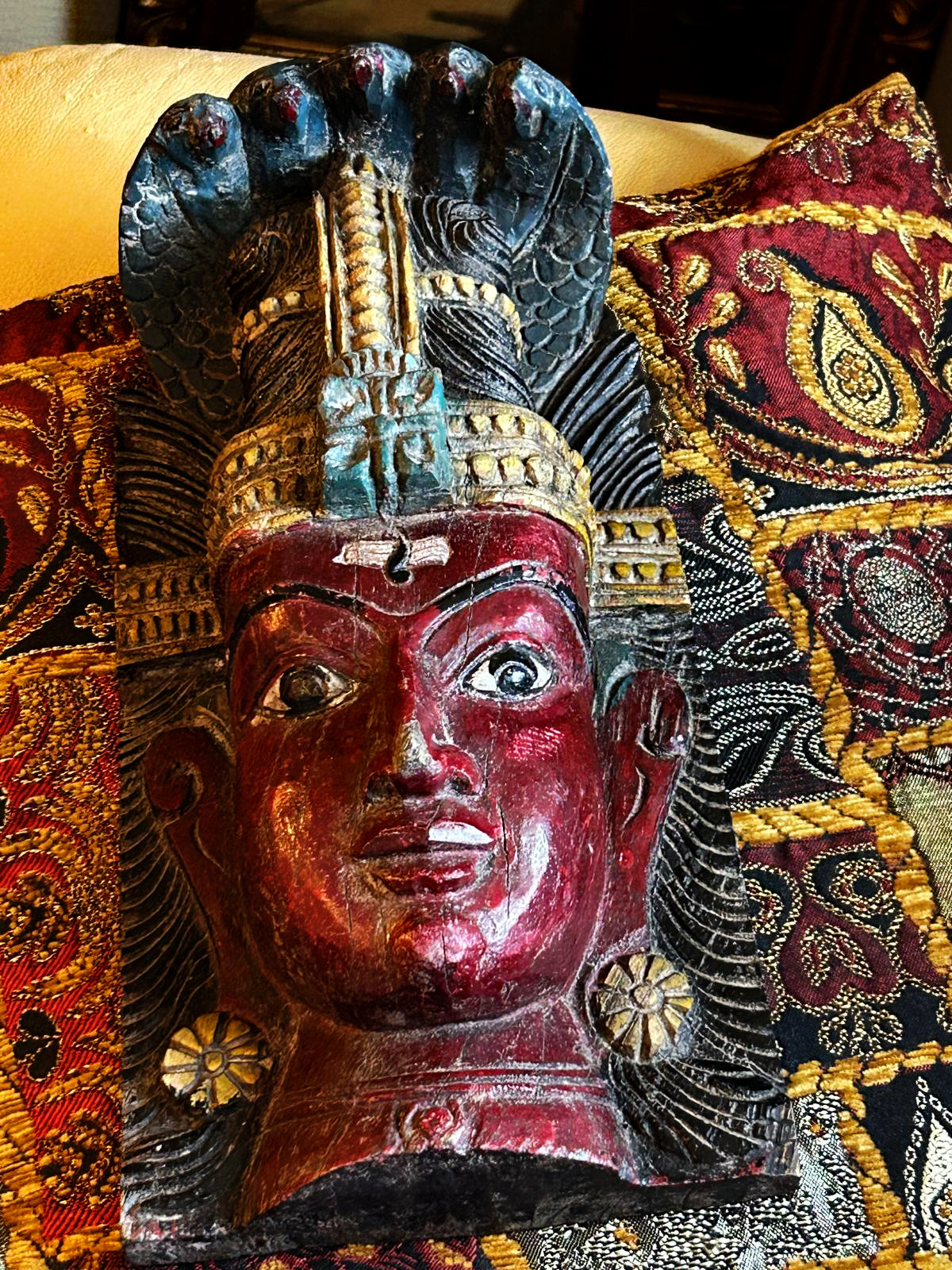 Detail of Shiva's polychrome face, third eye and trishula