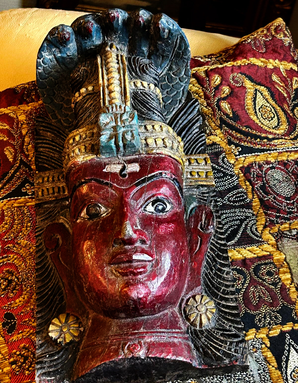 Side detail of the carved Shiva mask