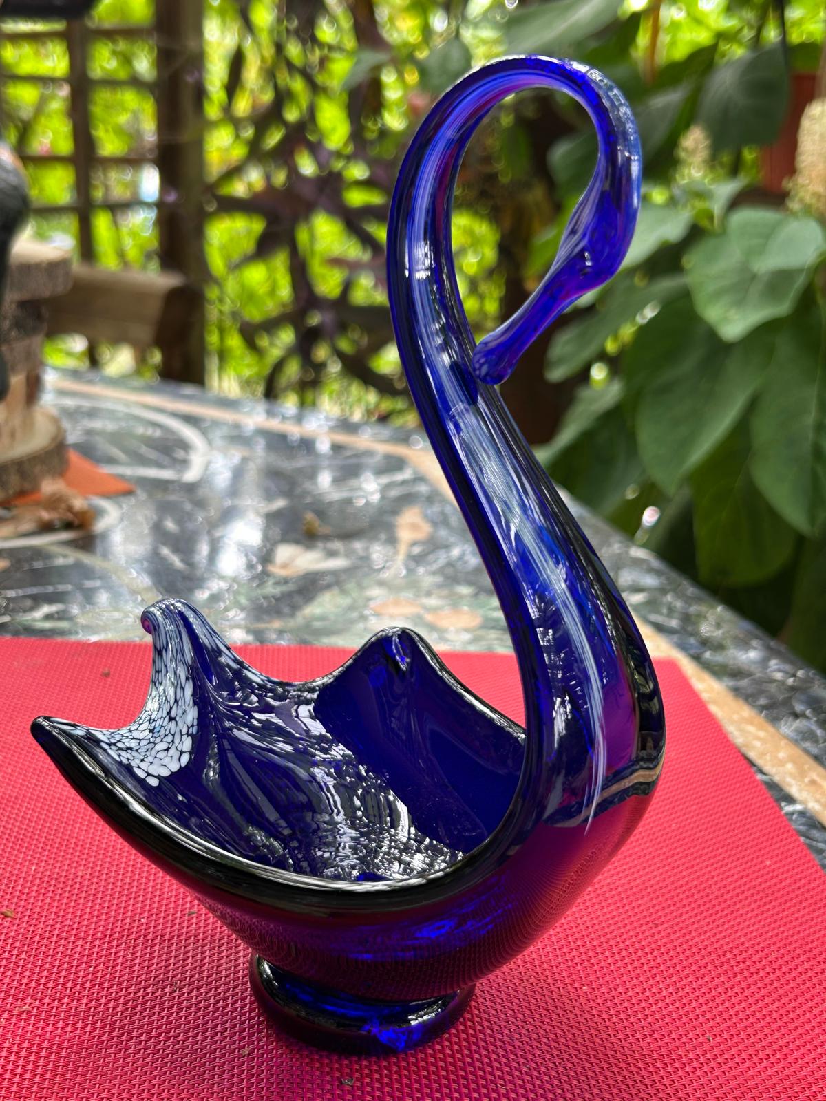 Cobalt blue Murano glass swan bowl with curved neck and white speckled interior